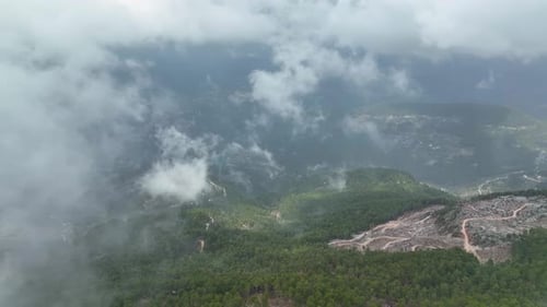 Cloudy landscape high in the mountains aerial view 4 K
