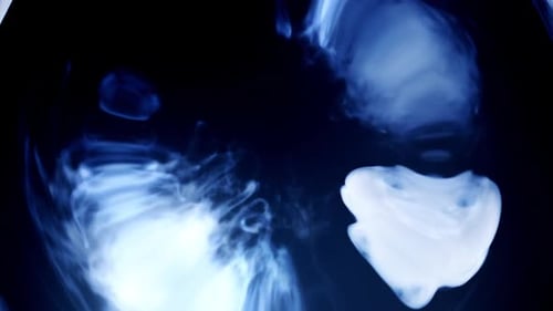 Blue smoke flowing in a circle