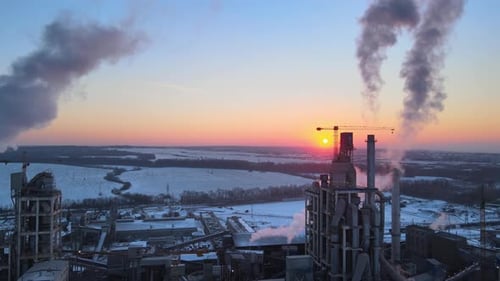 Aerial View of Cement Factory with High Concrete Plant Structure and Tower Crane at Industrial