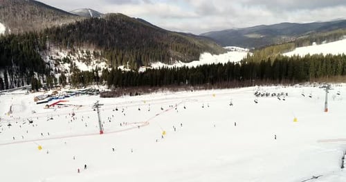 Aerial View of the Ski Resort in Mountains at Winter