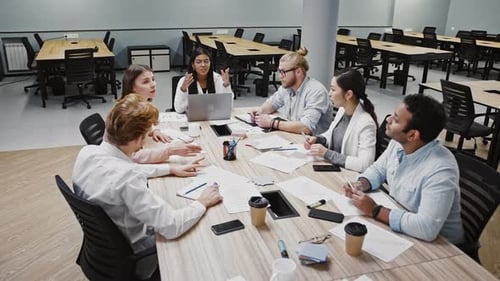 Diverse Team Collaborating During a Meeting in Office