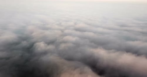 Beautiful Misty Dawn. Flying Above the Clouds, Drone Video