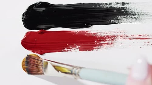Paint Brush Creates Colorful Gold Stroke