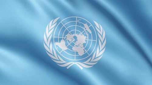 Realistic Waving United Nations Flag with Emblem Loop