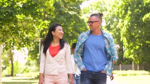 Happy International Friends Walking in Park 6