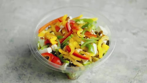 Colorful Salad Bowl with Peppers and Cheese