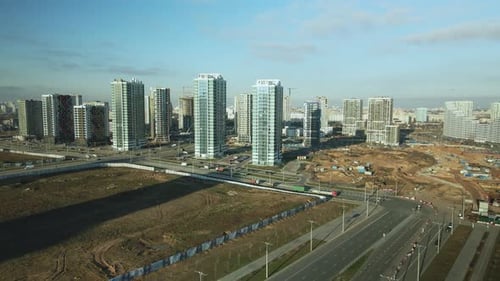Aerial View of Modern City with Construction