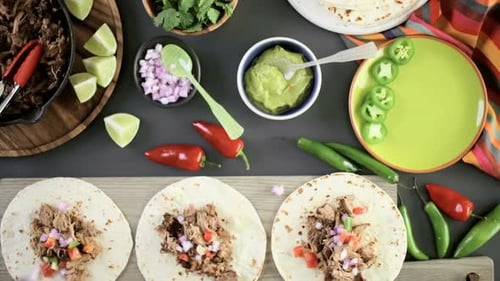 Tacos Being Prepared with Fresh, Delicious Ingredients
