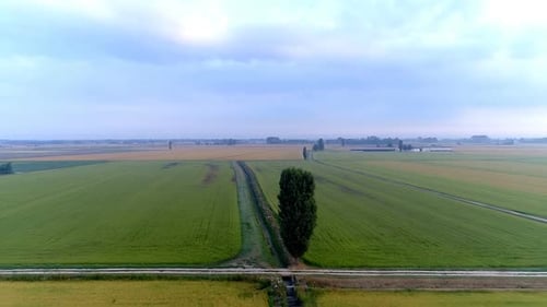 Aerial view of field in countryside 4k