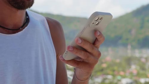 Details Hands of a Bearded Man Internet User Using Smartphone Checking Content in Social Media