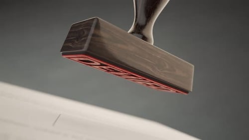 An important document being denied by red office stamp in slow motion. 4KHD