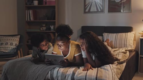 Mom with Kids in Bed