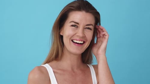 Smiling Woman with Long Hair Posing