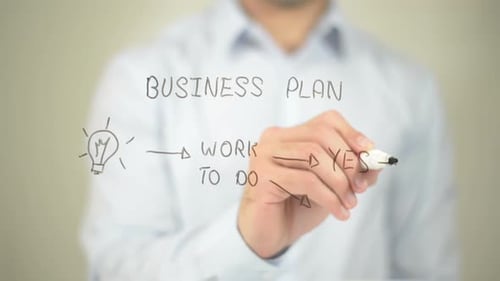Concept of Business Plan, Businessman Writing on Transparent Screen
