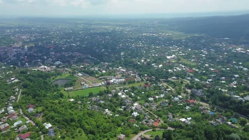 Aerial Drone View of a Big Village in a Mountain Valley