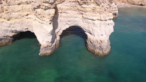 Flying over Praia Da Marinha (Marinha Beach) in Algarve, Portugal.