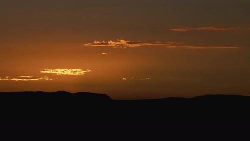 Beautiful Sunrise Time-Lapse over Silhouette Hills