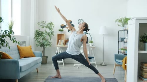 Slender Man Doing Yoga Stretches at Home