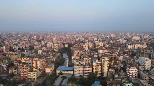 Panoramic aerial view of congested Dhaka city, mosque fly over, Bangladesh