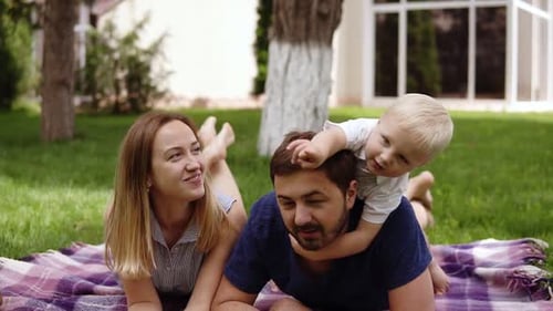 Family Fun Picnic on a Green Lawn