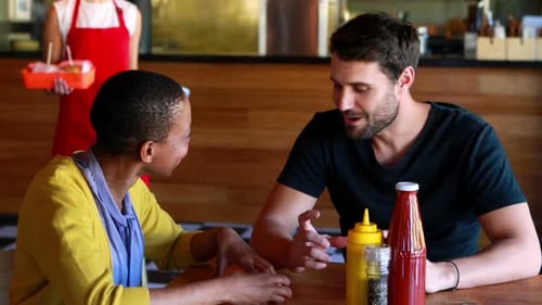 Couple at Restaurant Receives Food From Waitress