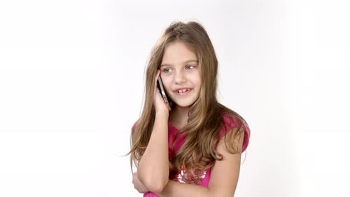 Smiling Girl Talking on Cell Phone in Studio