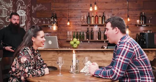 Couple at Dinner with Wine Service
