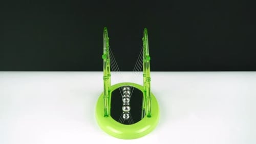 Green Pendulum Balls Newton On White Black Background 1