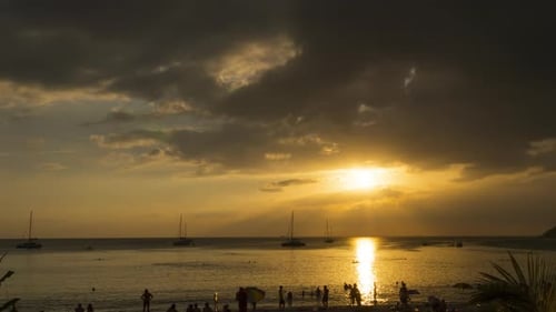 Beach Sunset with Sailboats in Tropical Location