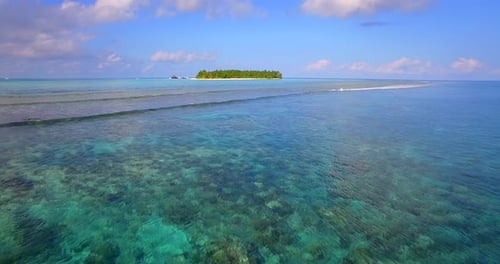 Aerial drone view of a scenic tropical island in the Maldives