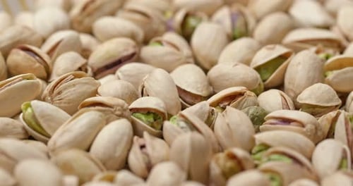 Pistachios in Shells Close Up Panning Left