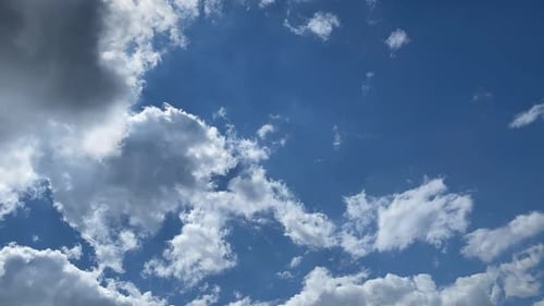 White Clouds Against a Vibrant Blue Sky
