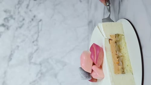 Fork Cutting Colorful Dessert Cake Slice Close Up