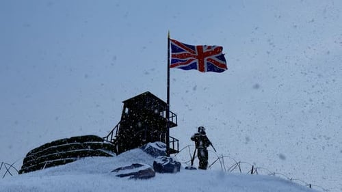British Soldier Watching the Border at Snowy Weather