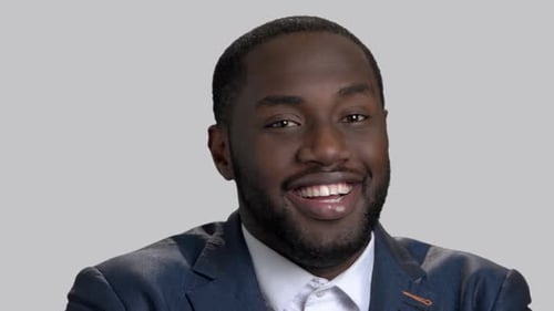 Smiling Man Close Up on Grey Background
