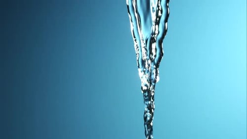 Water Flowing Down on Blue Background