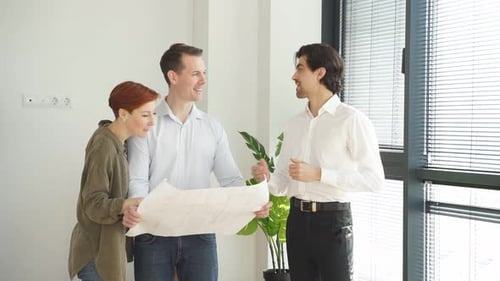 Real Estate Discussion in Modern Office Setting