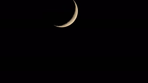 Waxing Crescent Moon in the Night Sky