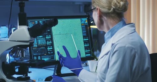 Scientist Using Transparent Display Screen