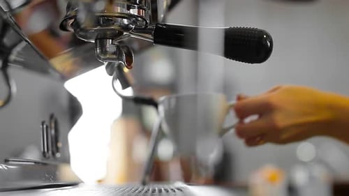 Footage of Pouring Coffee Stream From Professional Machine in Cup