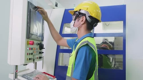 Male worker people wearing protective safety helmet and glasses in production line of factory.