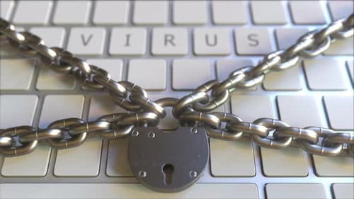 VIRUS Text on the Keys of a Keyboard with Padlock and Chains