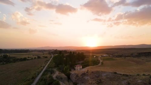 Scenic Aerial View of Rural Landscape at Sunset