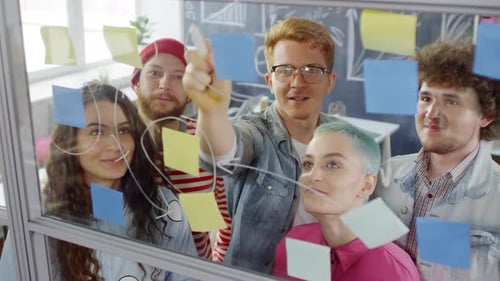 Young Team Brainstorming at Creative Agency