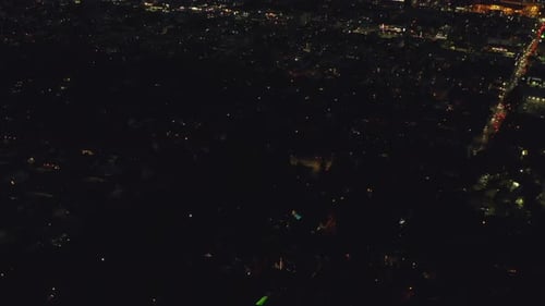 AERIAL: Over Hollywood Hills at Night with View on Downtown Los Angeles View,