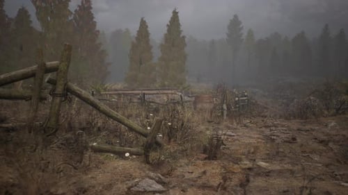 An Old Wood Fence with a Country Field Behind It