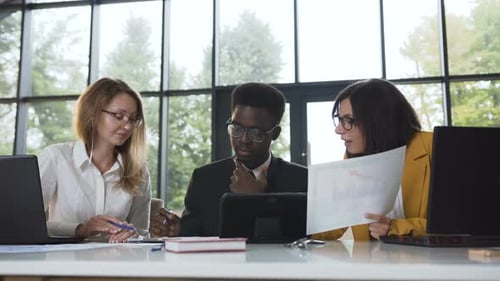 Creative Business Team Meeting in Modern Glass Office Multi Ethnic Group