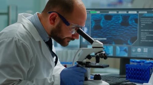 Scientist Using Microscope in Modern Laboratory