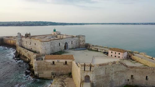 View of the Embankment of the Island of Ortigia During Sunrise. Bird's Eye View. Sicily. Italy
