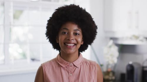 Woman Smiling in Kitchen Close Up Portrait
